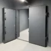 Porte de bunker para-souffle 1 bar 2 vantaux ouverte.