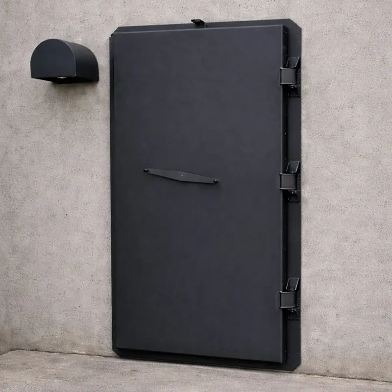 Vue extérieure d'une porte de bunker para-souffle 4.4 bar et étanche aux gaz, de couleur gris anthracite.